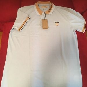 Burberry polo with new logo. Size 3XL but fits like a XL. New. Never worn.